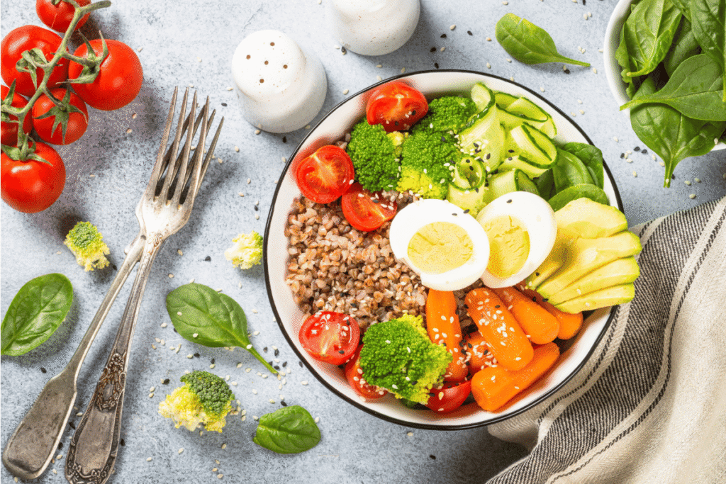 Food plate demonstrating PN hand method for portion control by online nutrition coach India